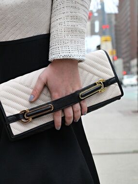 Calvin Klein NEW quilted leather clutch cream body black trim gold hardware NWT